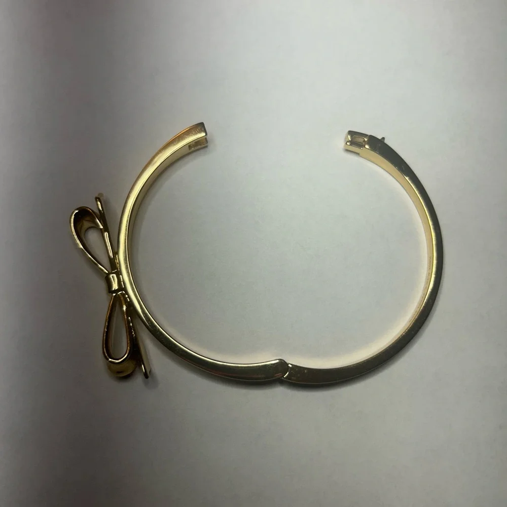 Kate Spade New York Elegant Gold Tone Bow Bracelet Designer Jewelry Gift for Her - Picture 3 of 5